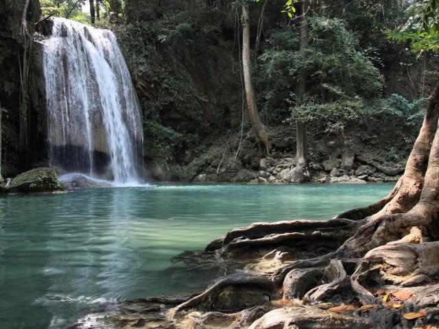 Take a dip in Erawan Waterfall