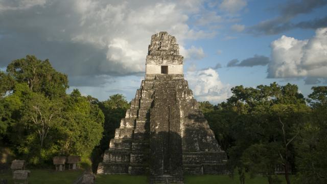 Watch sunrise over Tikal ruins