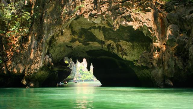 Kayak through mysterious sea caves