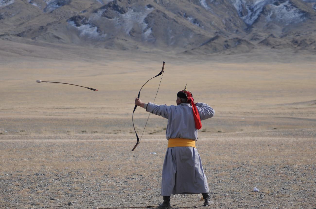 Mongolian shooting with a bow and arrow